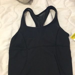 Never worn workout top, built in bra!